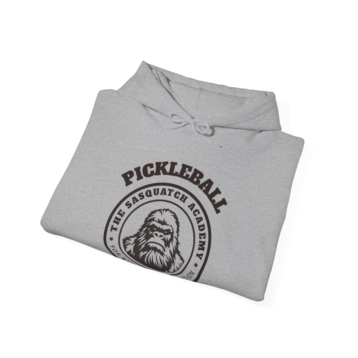 The Sasquatch Academy for Kitchen Domination. Pickleball. Unisex Heavy Blend™ Hooded Sweatshirt