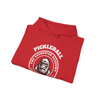 The Sasquatch Academy for Kitchen Domination. Pickleball. Unisex Heavy Blend™ Hooded Sweatshirt